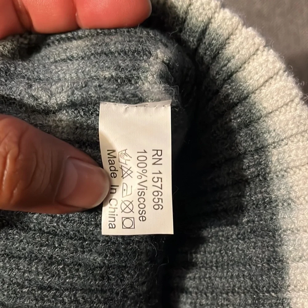 Unknown brand super soft 100% viscose cuffed winter beanie.  Like new condition.